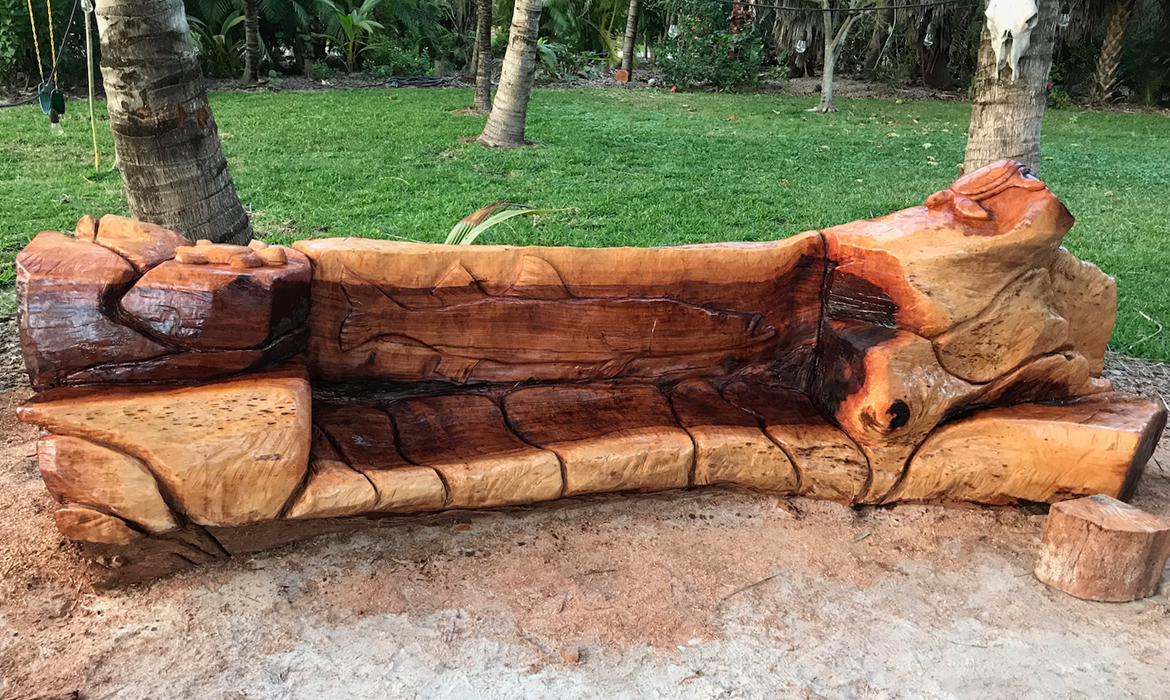 16 ft Carved Austrailian Pine Bench on Little
                Gasparilla Island Florida