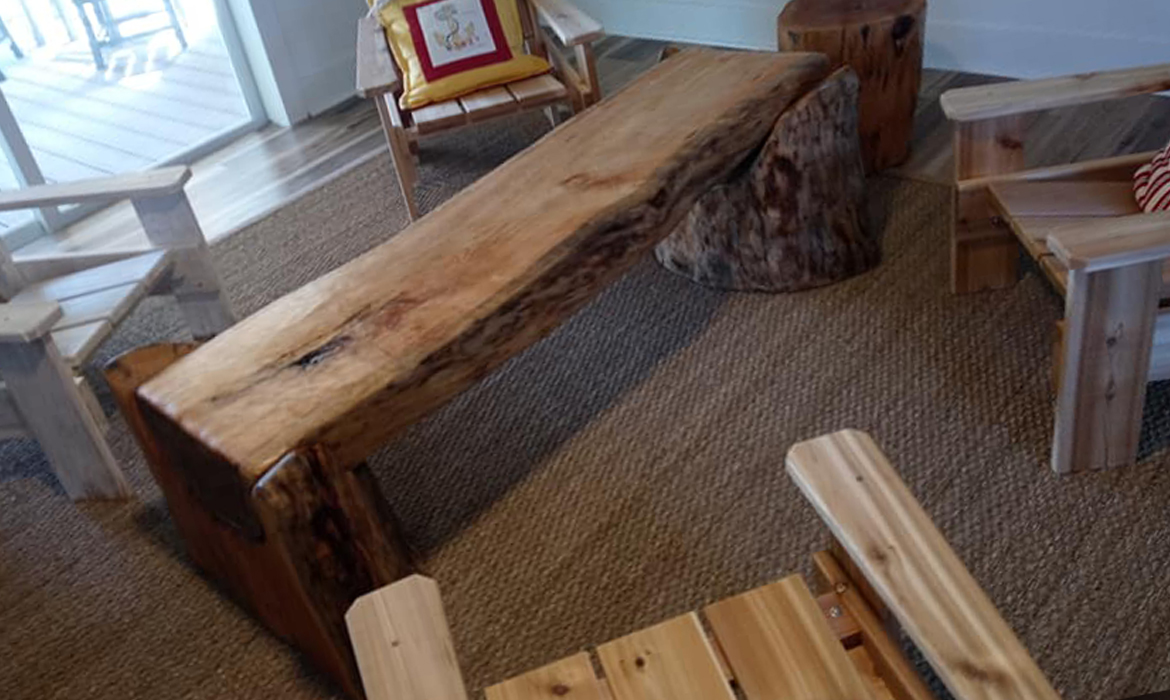 Coffee Table Carved from a Reclaimed Tree by
                  Elvis Caron