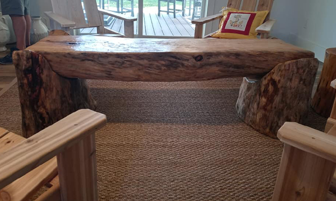 Coffee Table carved from a single log by Elvis
                  Caron